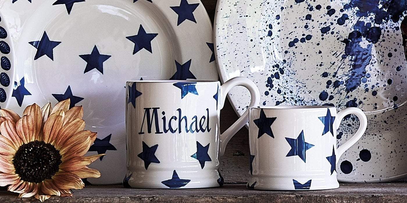 Emma Bridgewater Blue Star designs hand sponged onto cream pottery as mugs and plates, give as a present to a friend