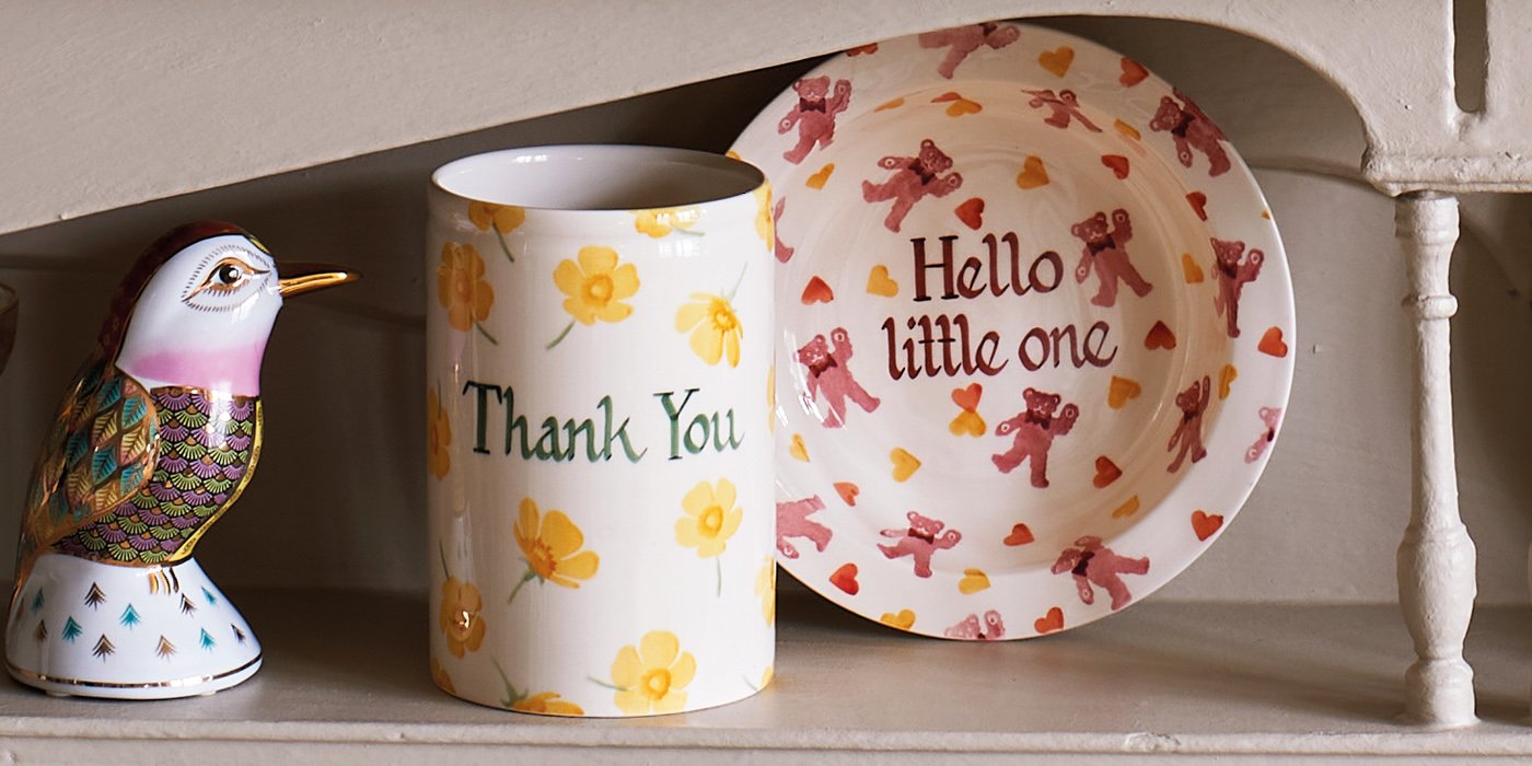 New baby gift ideas. A mug and plate commemorating a Christening Day written across both Emma Bridgewater pottery. Would make a perfect gift for Christenings and baby showers.