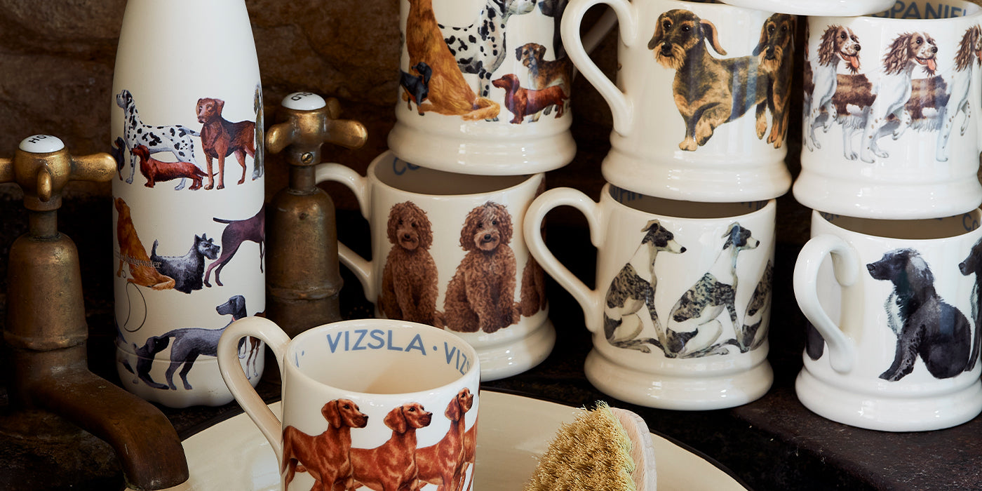 Ceramic dog and cat bowls in small and large sizes, hand decorated with cute patterns such as polka dots, stars and flowers, personalised with your pet's name.