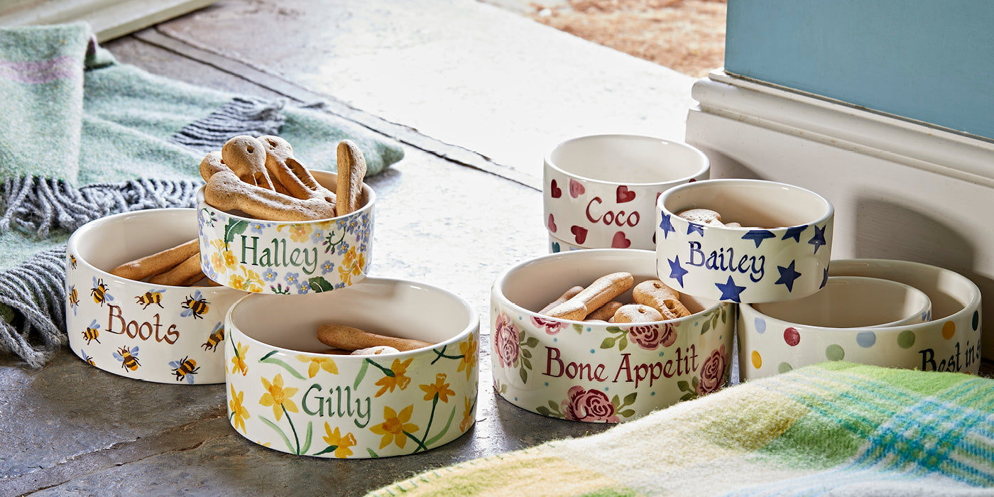 Our personalized ceramic pet bowls come in different sizes with hand painted patterns & name letterings. Get a custom pet bowl for your furry friend today!